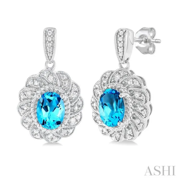 1/20 ctw Oval Cut 7X5 MM Blue Topaz and Round Cut Diamond Semi Precious Earring in Sterling Silver