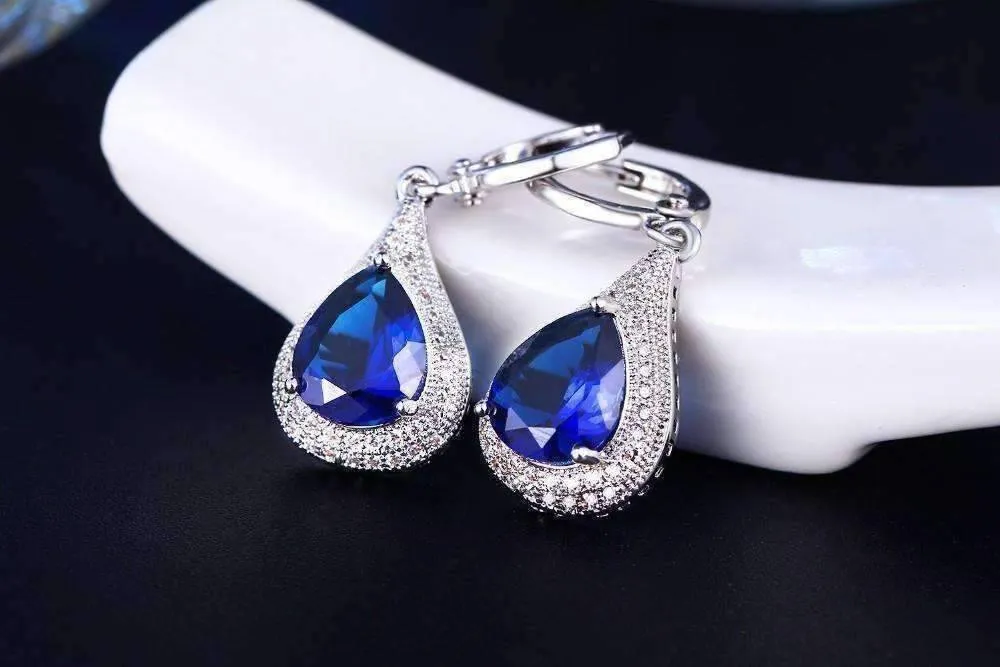 Beau Monde Pear Cut Simulated Sapphire and Milgraine Hoop Earrings